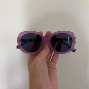 Purple sunglasses! Used a few times, great condition! No noticeable flaws.